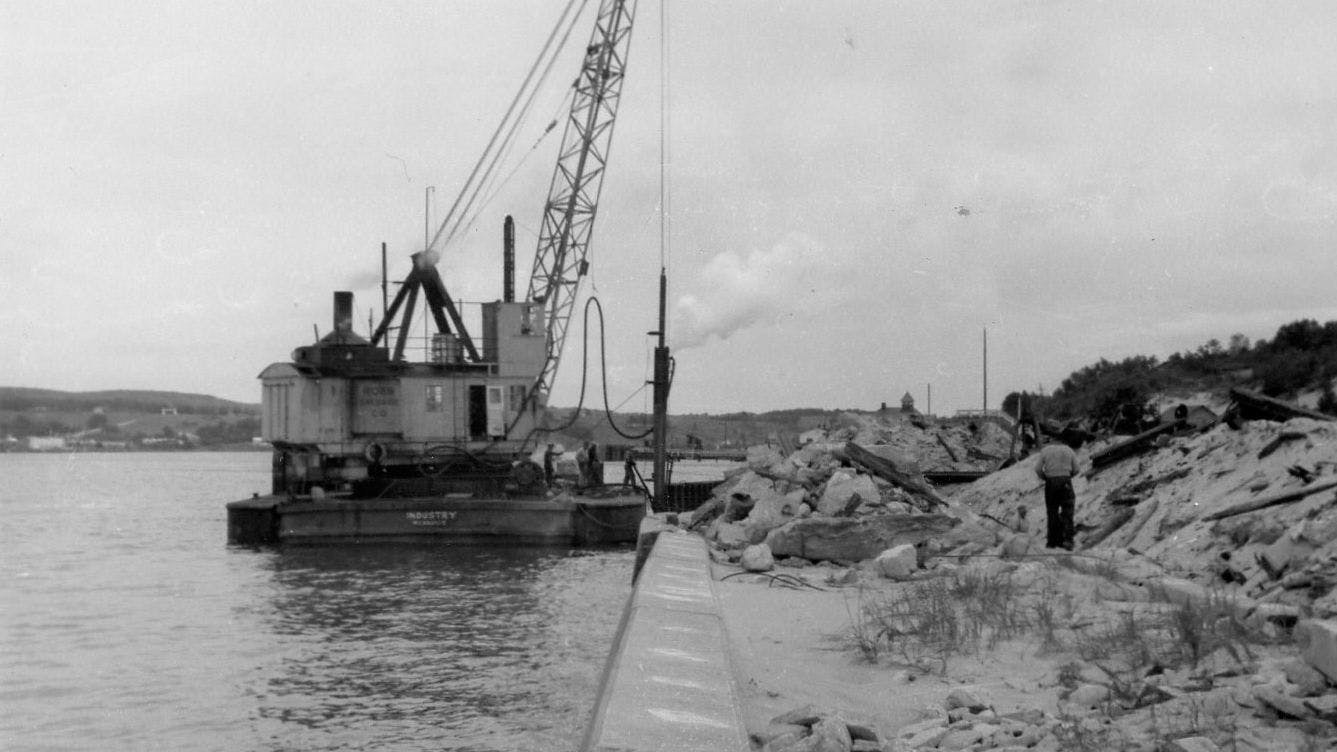 a black and white image of a dredging rig in the Great Lakes