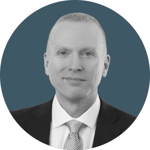 a headshot of brock masterson of crum and forster