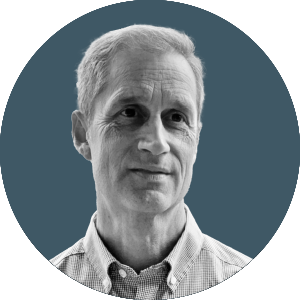 a headshot of tom williams from cna