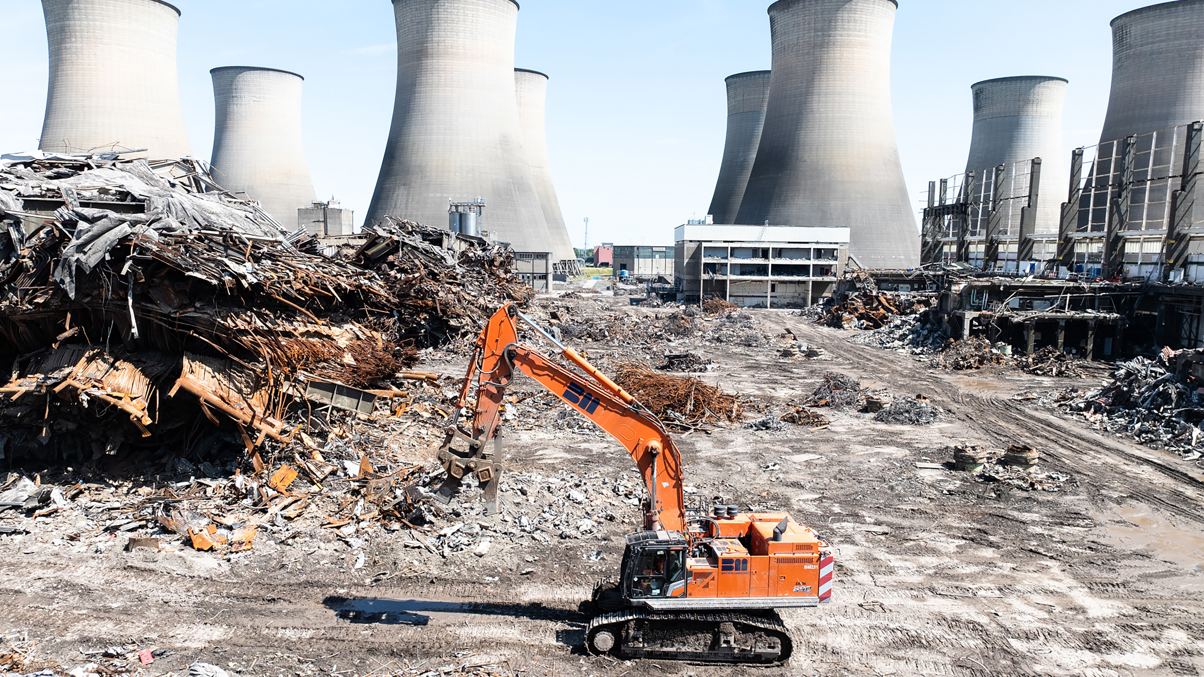 a crane lift excavator on a nuclear plant site