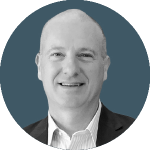 a headshot of John Shrader from Arcoro