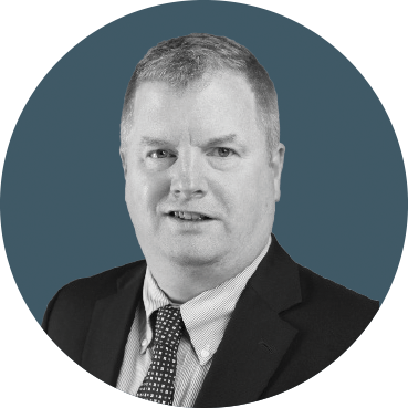 a headshot of jay quillinan