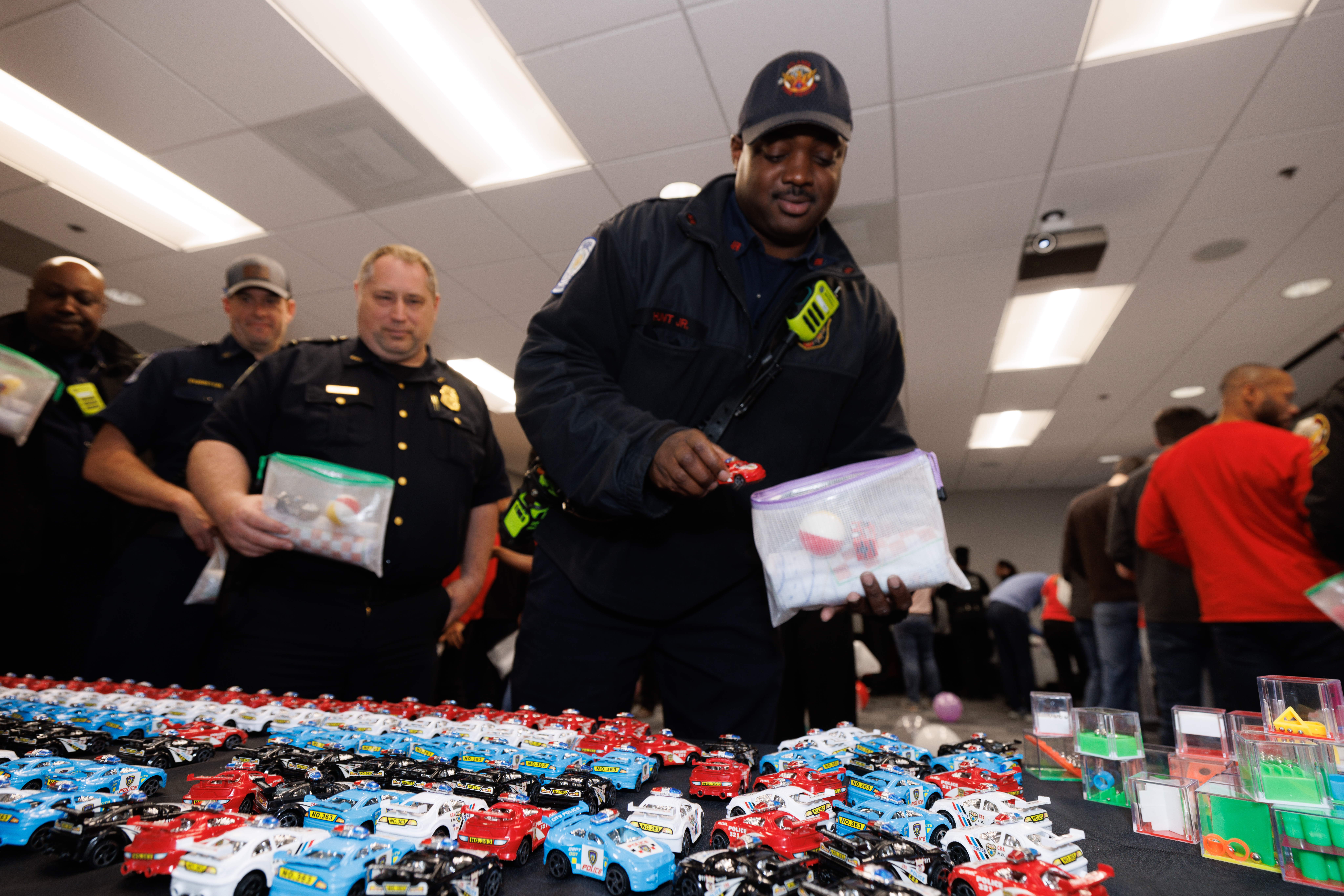 police officers building trauma kits for kids