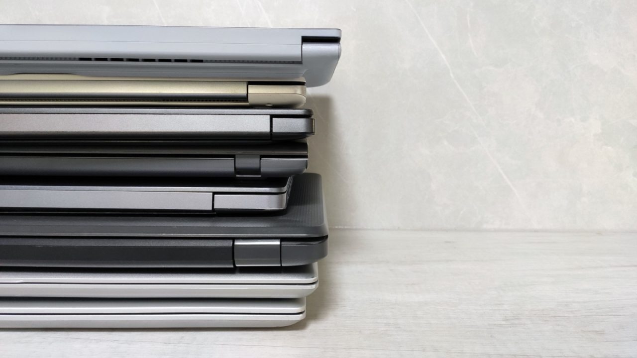 a stack of laptop computers