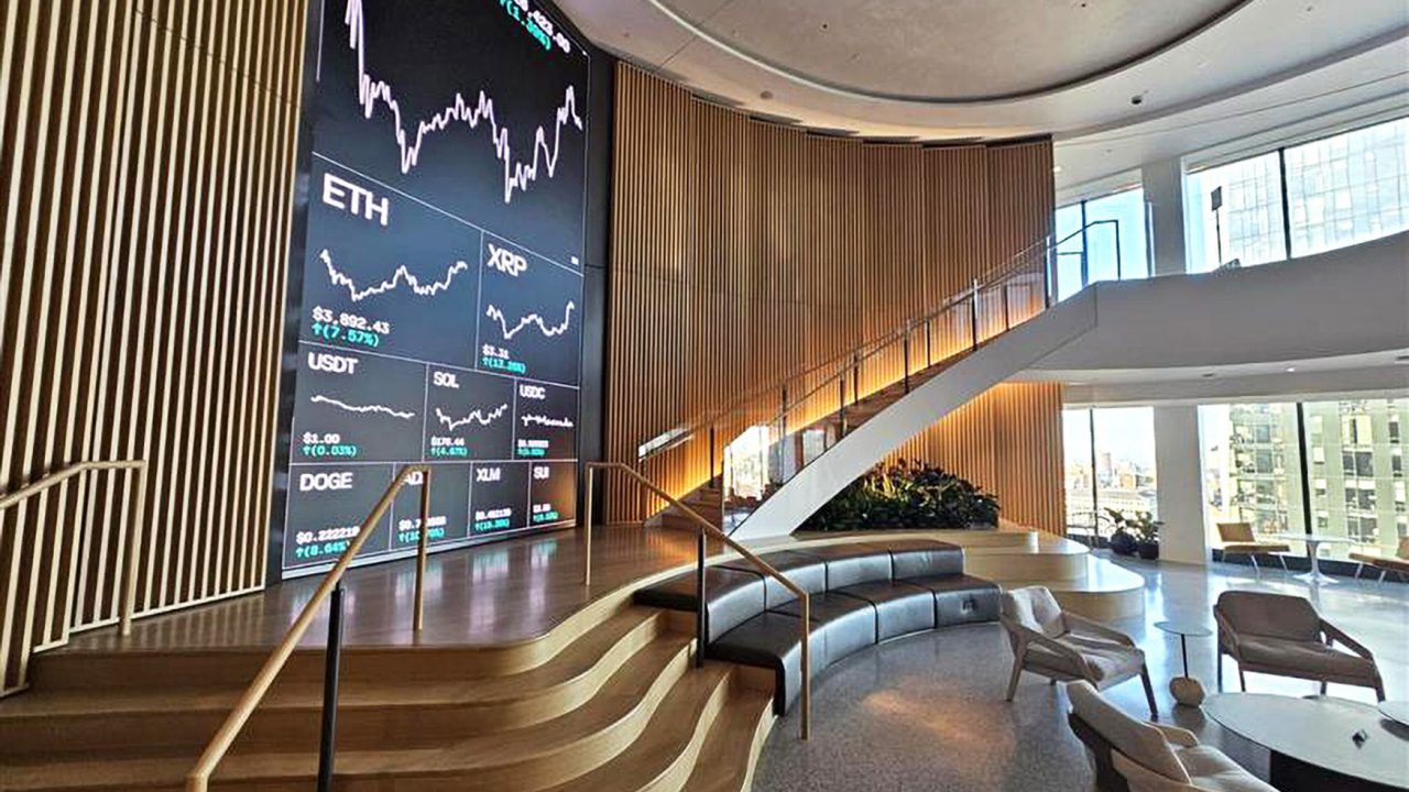 A custom curved staircase in Coinbase's in New York City, NY office.
