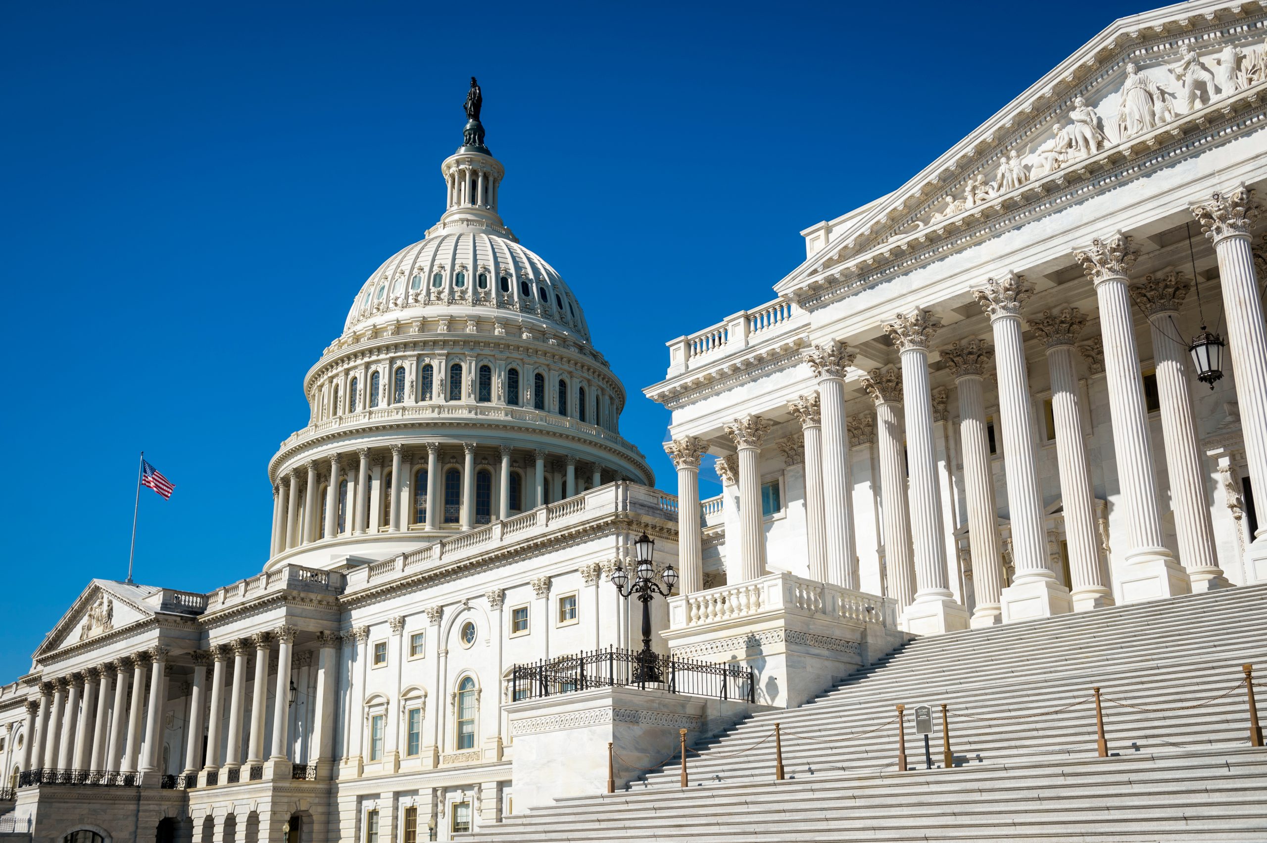 Bright morning view of the traditional neoclassical architecture of the Capitol Building’s dome, columns, and steps in Washington DC, USA The Capital building in Washington D.C.