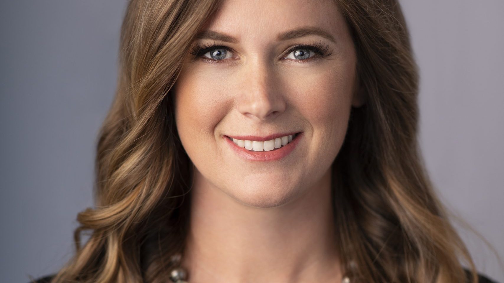 Headshot of Lauren Gibbs, the CEO of Gibbs Construction.
